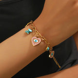 Nazar Bracelet detail — 18k gold evil eye talisman, hypoallergenic jewelry